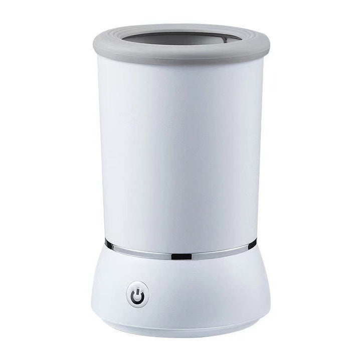 Automatic pet paw washing pedicure cup with a power button on a white background