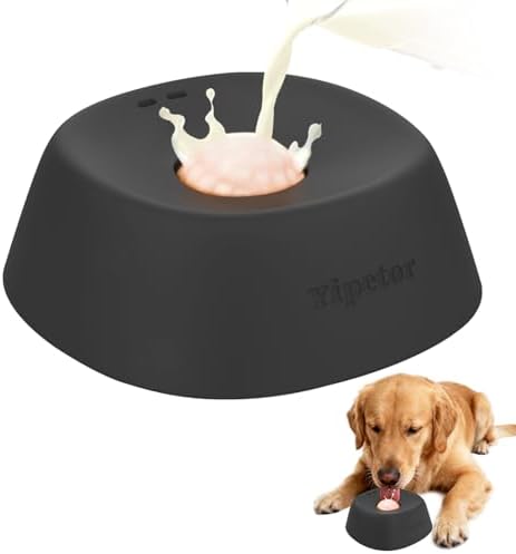 Black dog bowl with a pink interior and a dog drinking from it on a white background