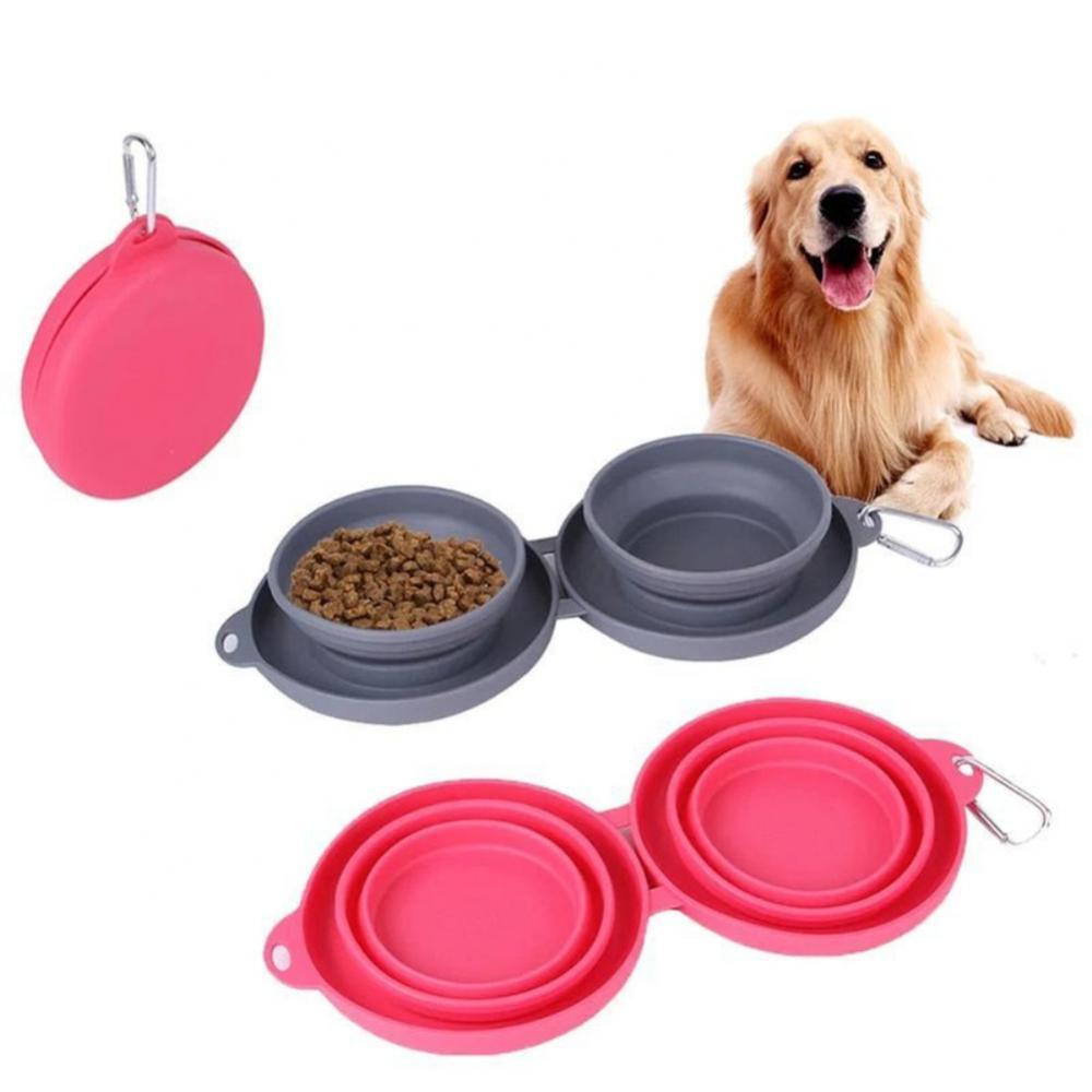 Collapsible pet bowls in gray and pink with a dog on a white background