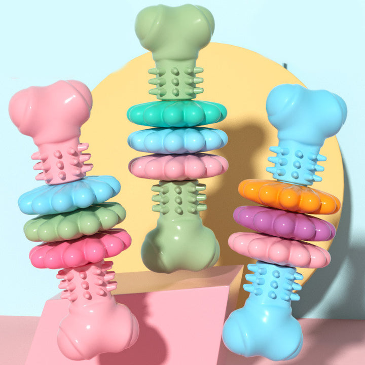 Colorful stackable baby teething toys on a pastel background