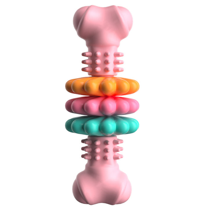 Colorful massage tool with pink base and multicolored stacked rings on a white background