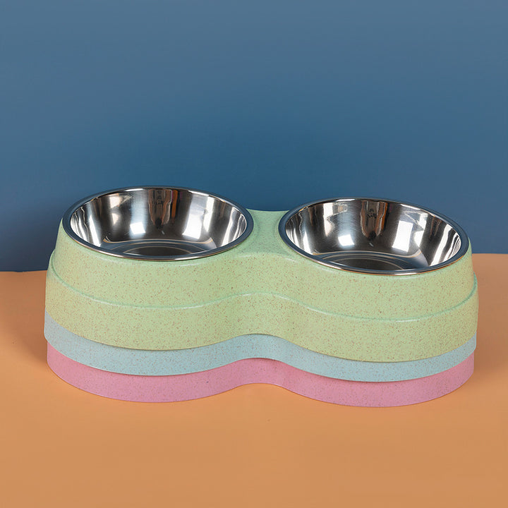Colorful pet bowl with two stainless steel bowls on a blue and orange background