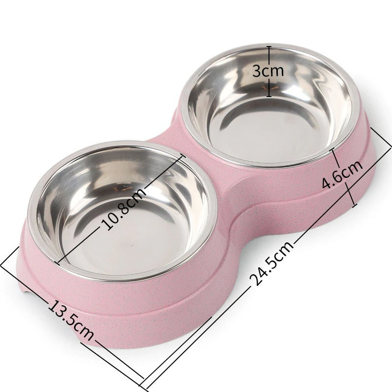 Pink pet bowl with stainless steel compartments and measurements on a white background