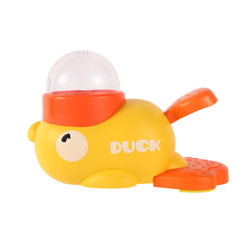 Toy duck with an orange beak and feet on a white background