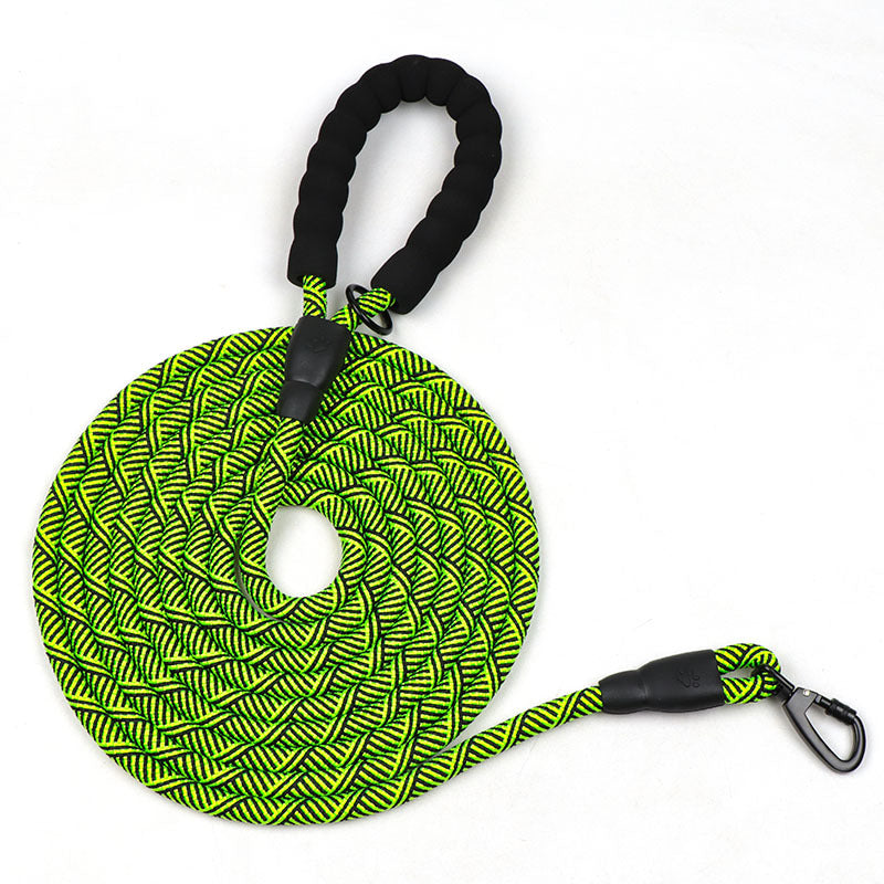 Green and black braided rope with a carabiner on a white background