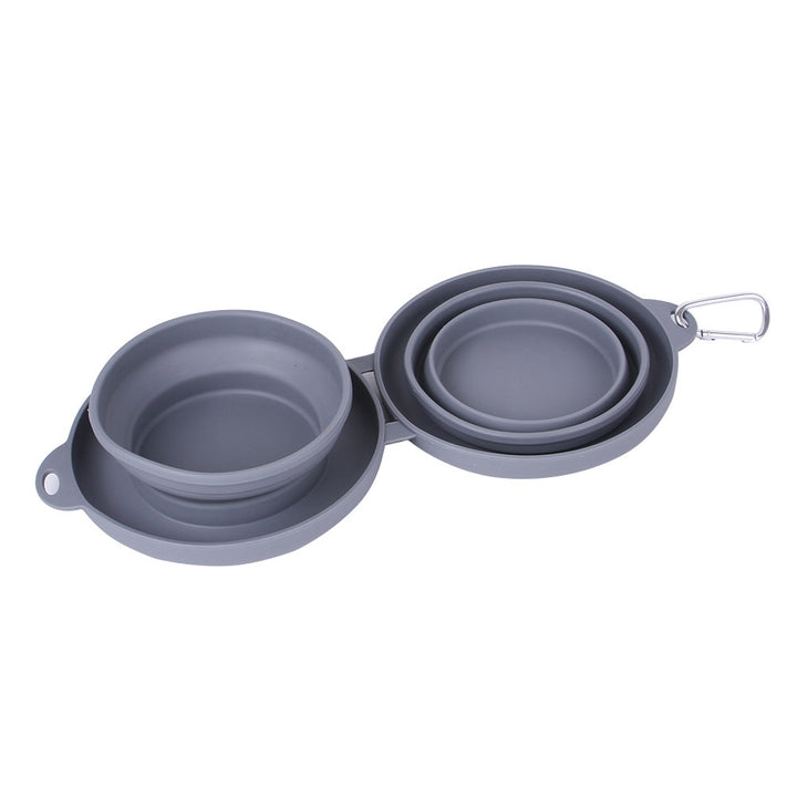 Set of two gray silicone bowls with a carrying strap on a white background