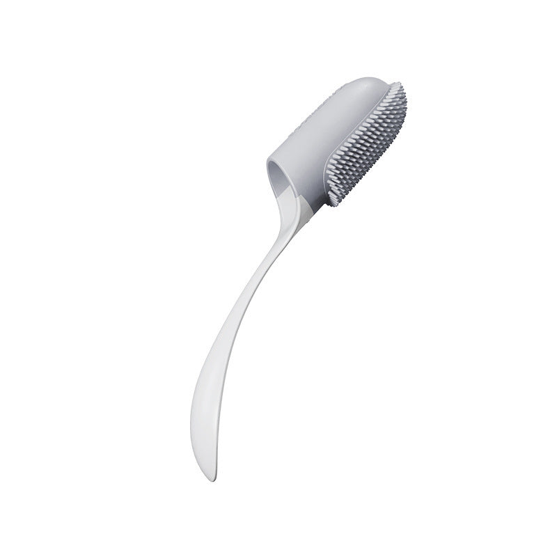 Grey pet tooth brush with bristle head on a white background