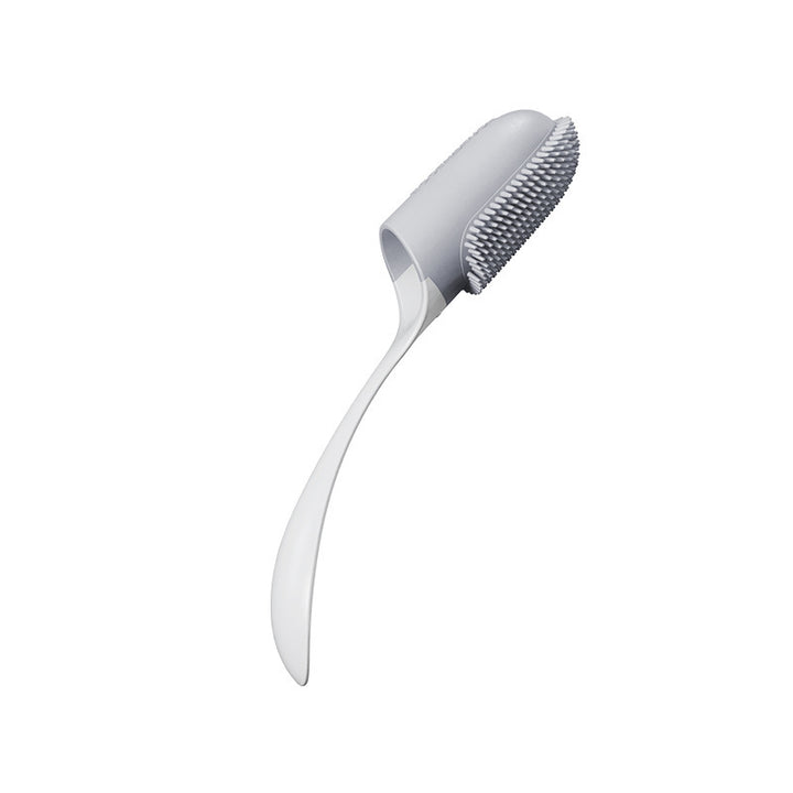 Grey pet tooth brush with bristle head on a white background