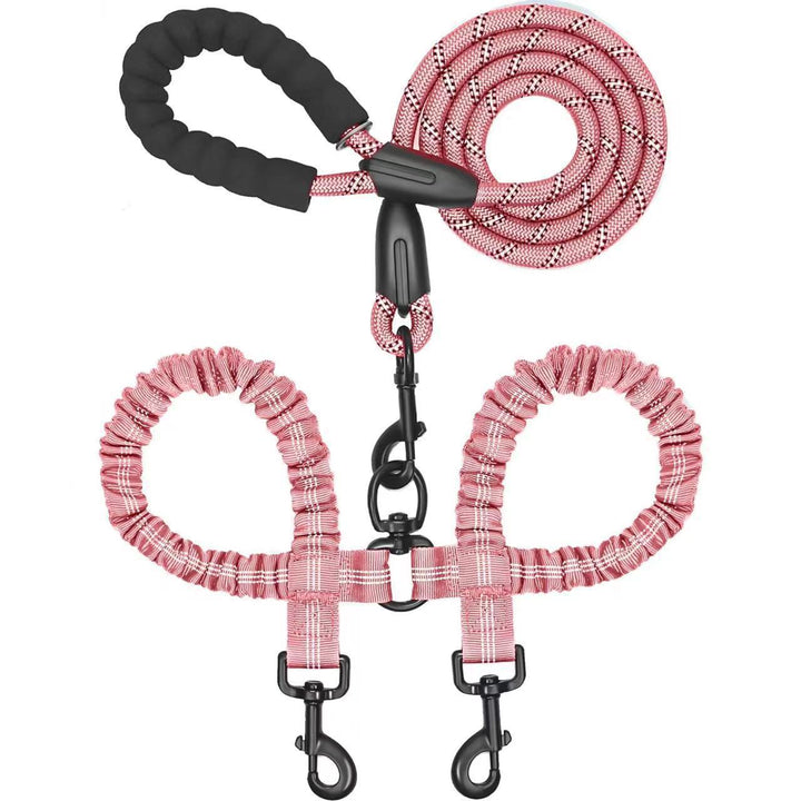 Pink dog leash with black connectors on a white background