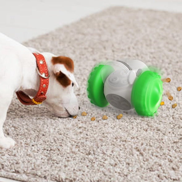 Dog playing with a green and gray toy on a carpeted floor