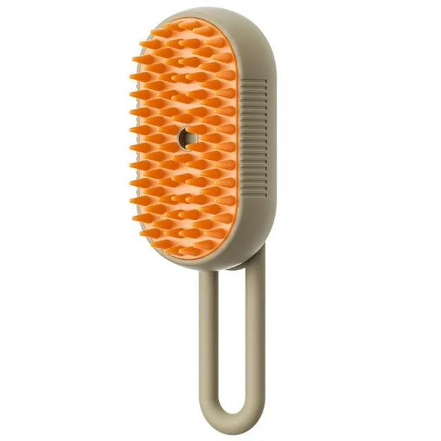 Pet grooming brush with orange bristles on a beige handle against a white background