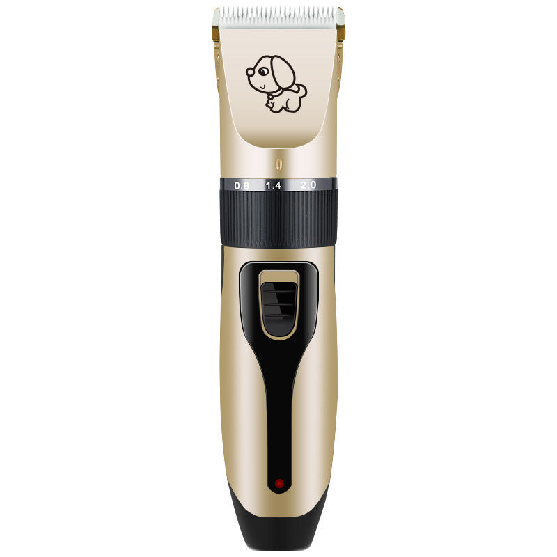 Gold and black pet grooming clipper on a white background