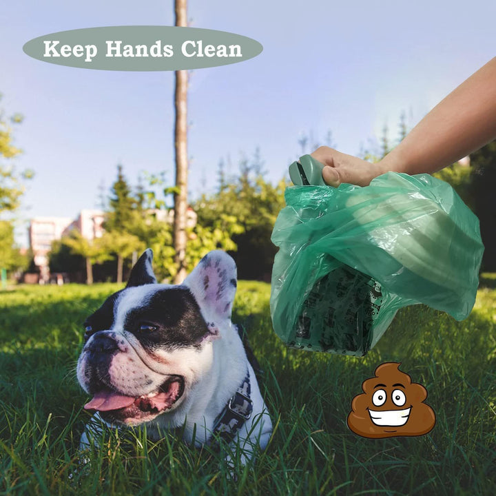 Person holding a green bag with a dog lying on grass, promoting keeping hands clean.