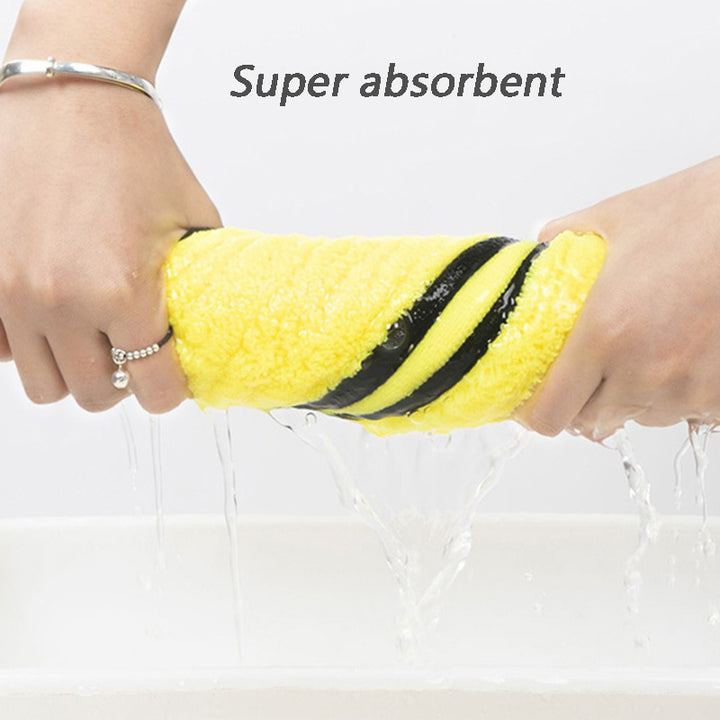 Yellow corn being squeezed with water dripping, labeled 'Super absorbent'.