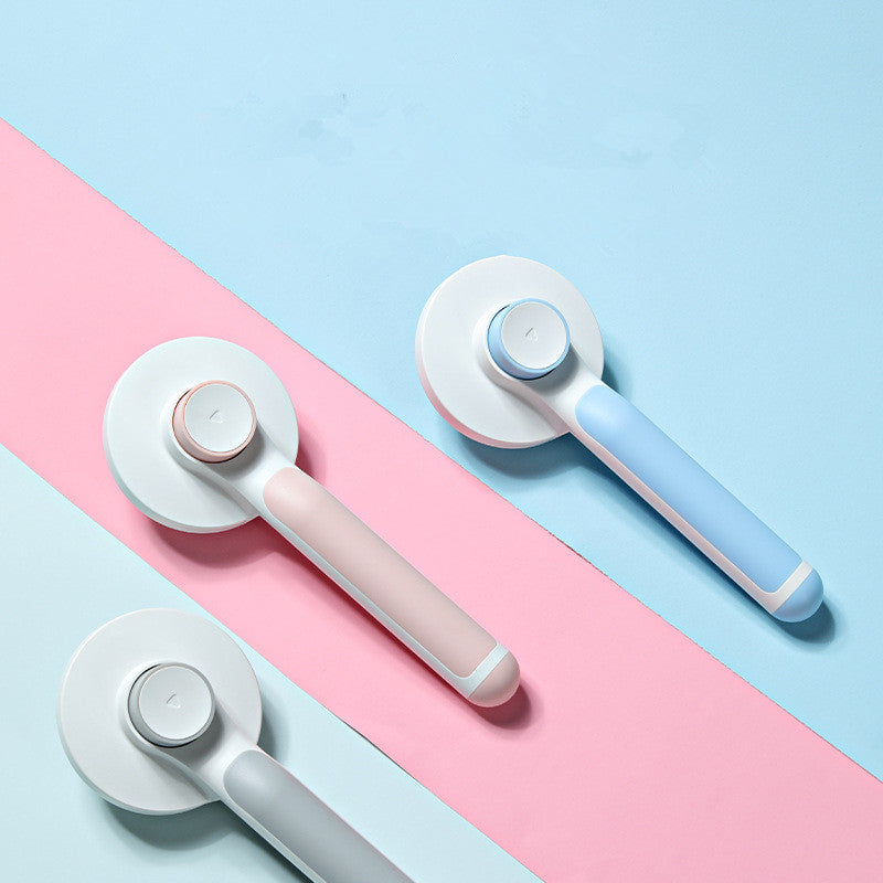Three cylindrical tools with wheels on a pink and blue background