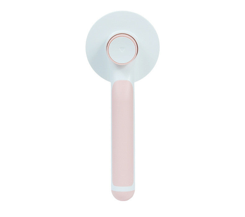 Handheld device with a light blue circular top and pink handle on a white background
