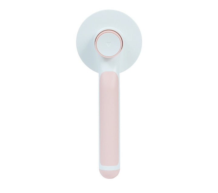 Handheld device with a light blue circular top and pink handle on a white background