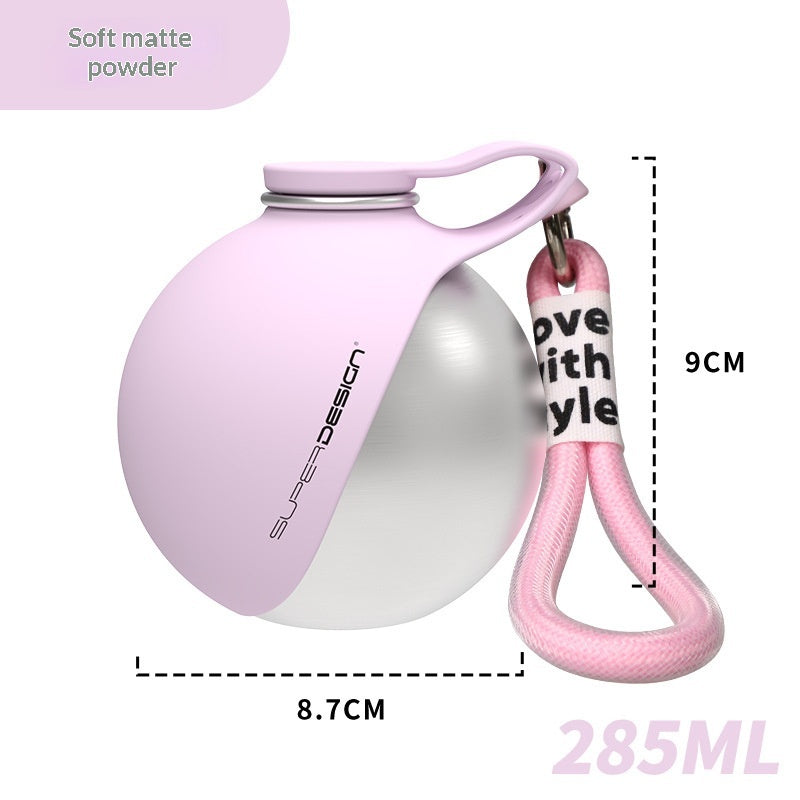 Pink and white water bottle with a measurement label on a white background