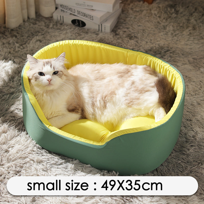 Cat lying on a green and yellow pet bed with text indicating size on a fluffy carpet.