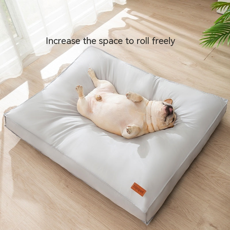 Dog lying on a large white pet bed with text 'Increase the space to roll freely' on a wooden floor.