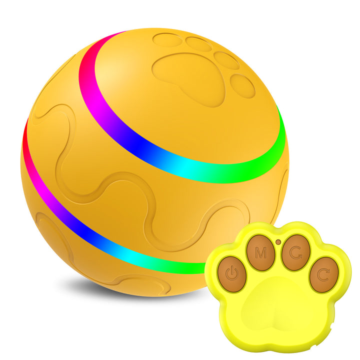Yellow ball with colorful LED strip and paw-shaped remote control on a white background