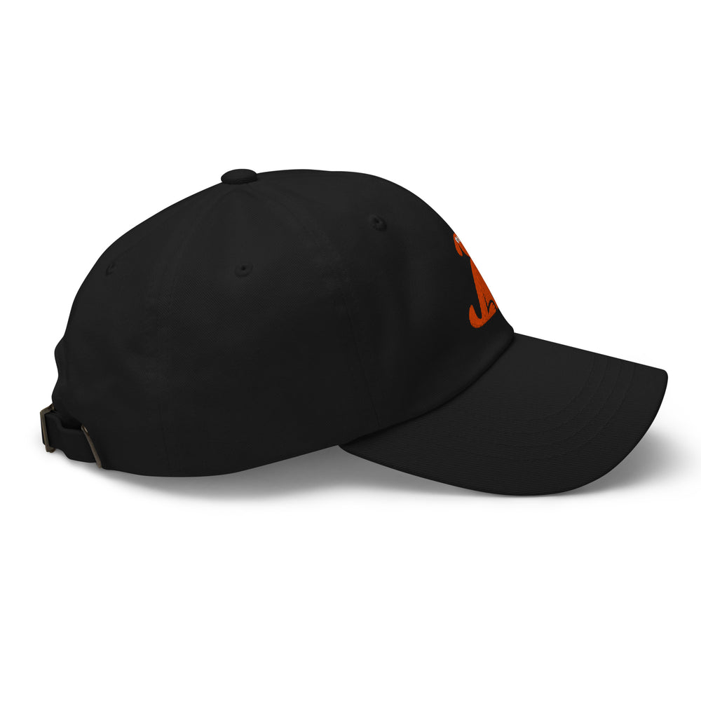 Black cap with orange logo on a white background