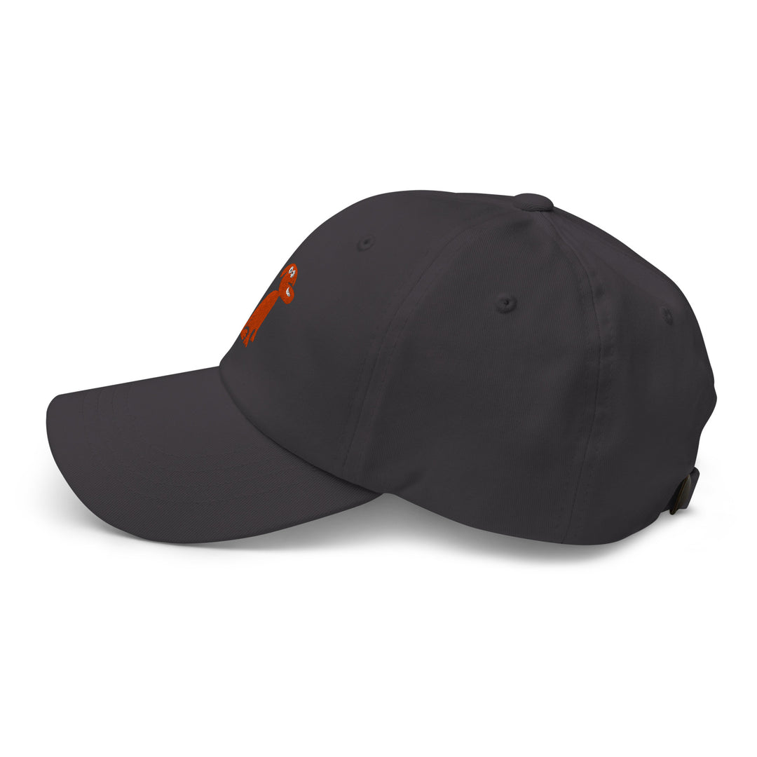 Black cap with a small orange logo on a white background