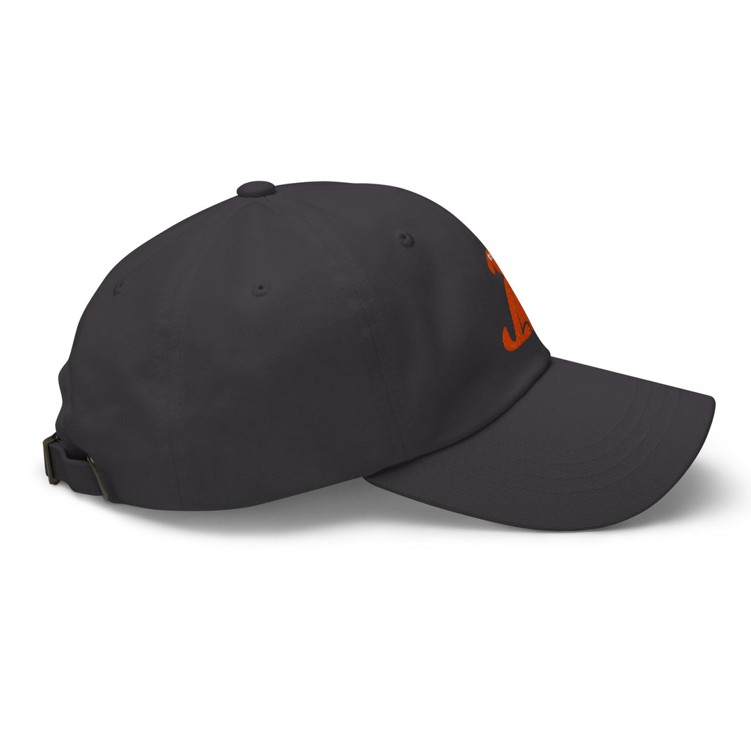 Black cap with a small orange logo on a white background