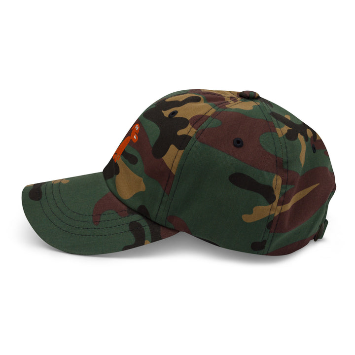 Camouflage baseball cap on a white background
