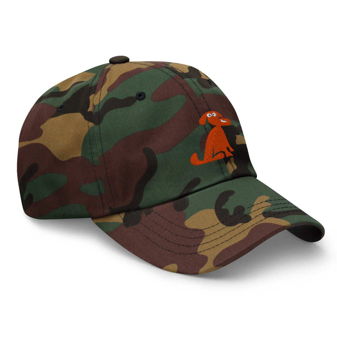 Camouflage baseball cap with a small orange dog illustration on a white background