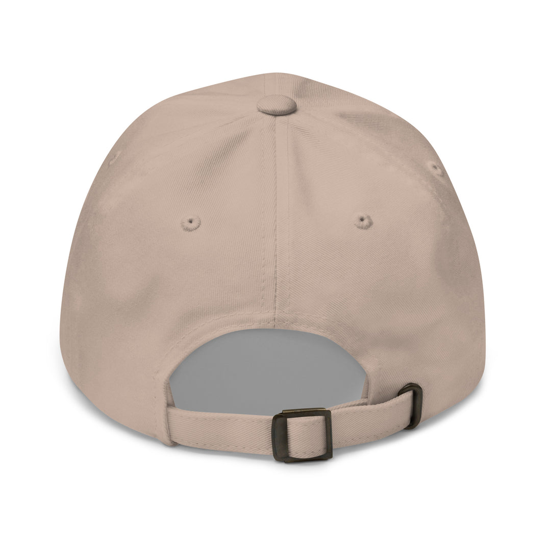 Beige baseball cap with a gray patch on the back against a white background