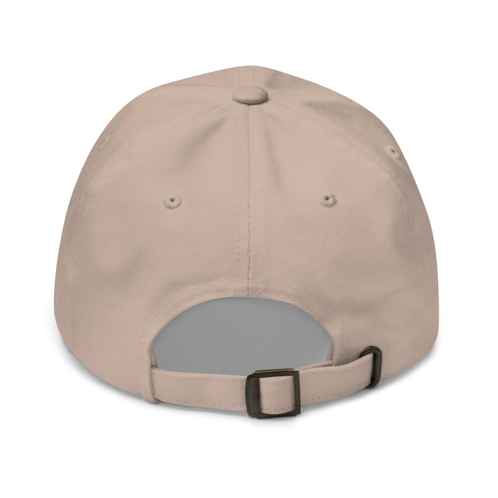 Beige baseball cap with a gray patch on the back against a white background