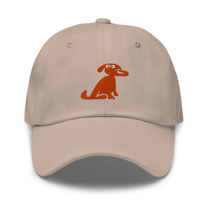 Beige cap with a red dog illustration on a white background