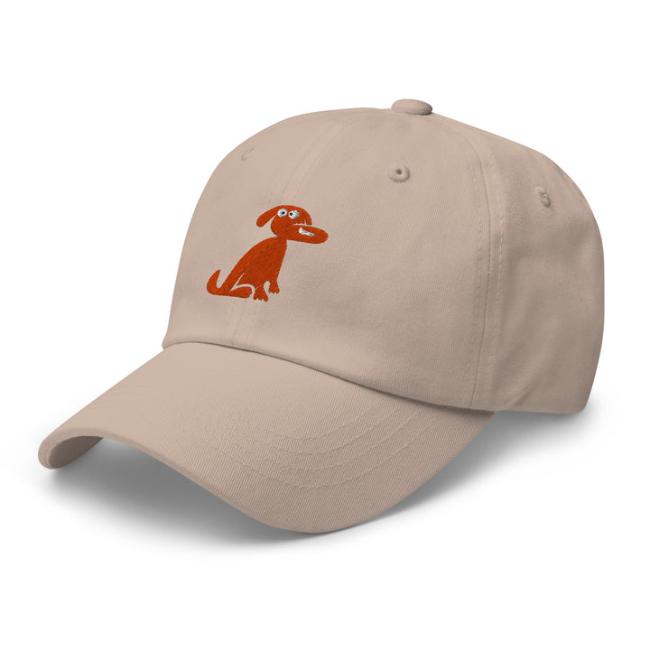 Beige cap with a brown dog illustration on a white background