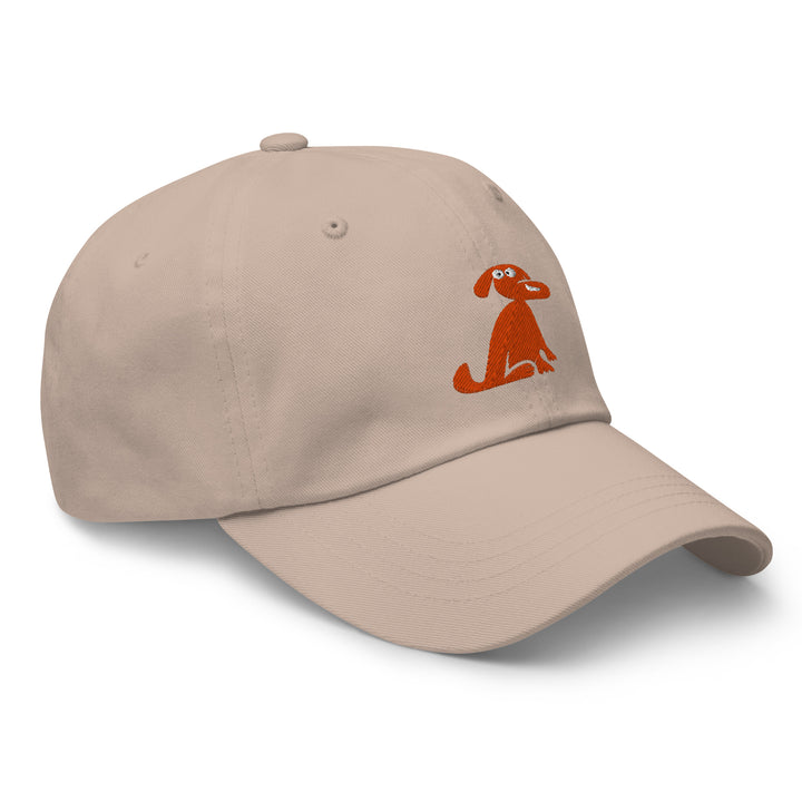 Beige cap with a brown dog illustration on a white background