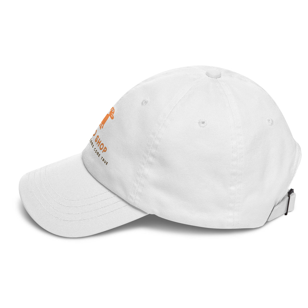 White cap with doggo shop logo on a white background