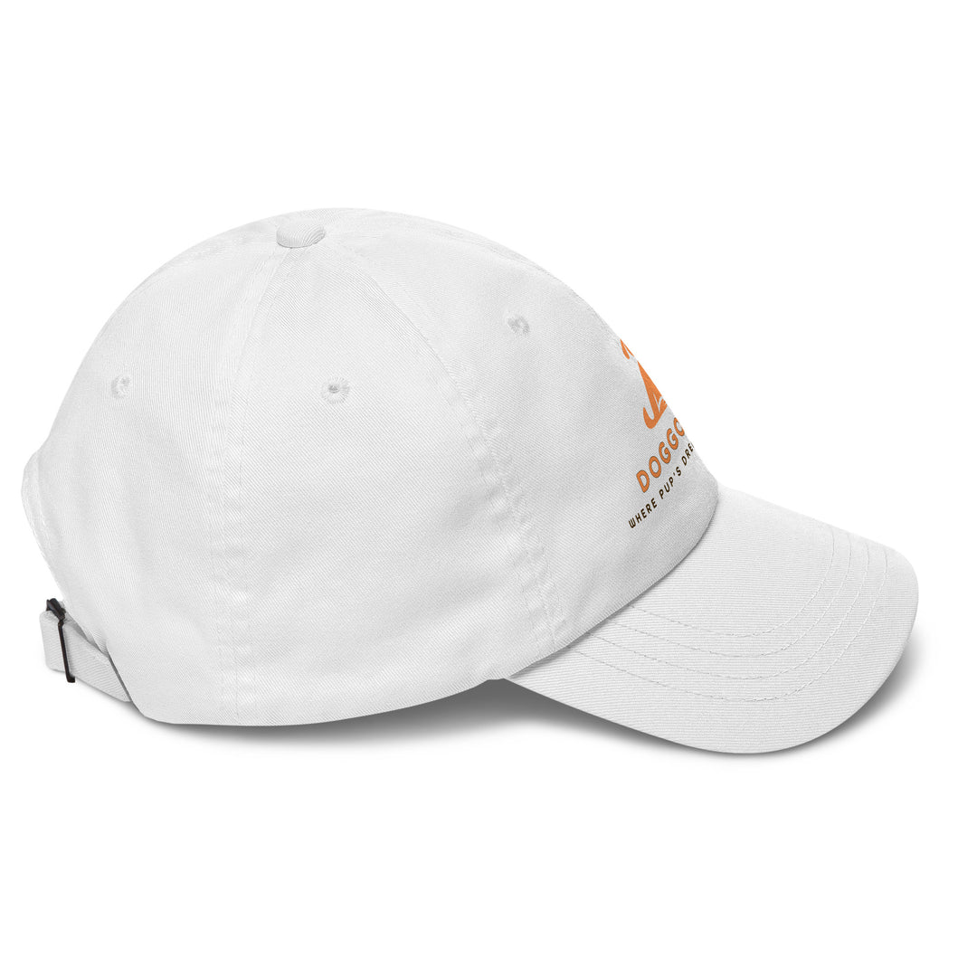 White cap with doggo shop logo print on a white background