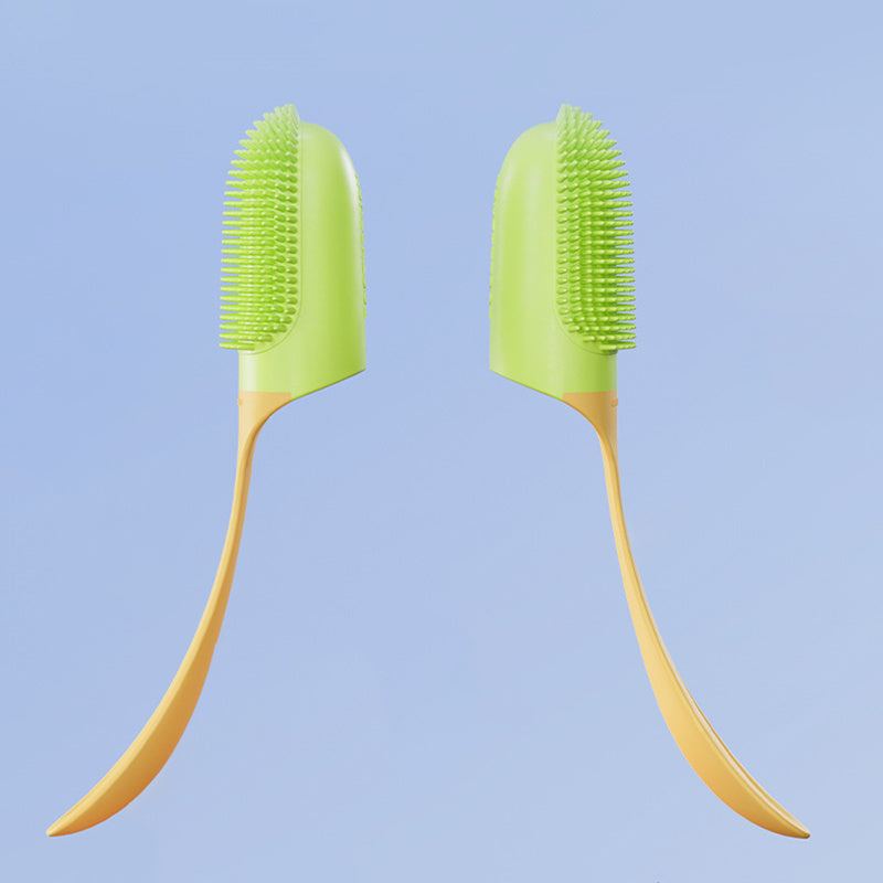 Two green and yellow toothbrushes on a light blue background