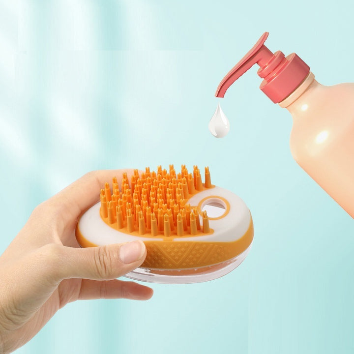 Hand holding a hairbrush with orange bristles, next to a bottle of shampoo with a pump.