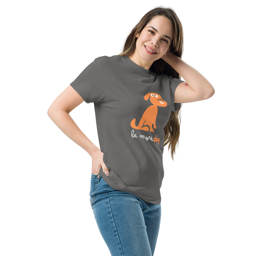 Woman wearing a gray t-shirt with an orange dog graphic and text on a white background