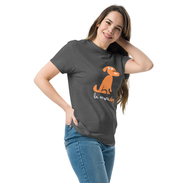 Woman wearing a gray t-shirt with an orange dog graphic and text on a white background