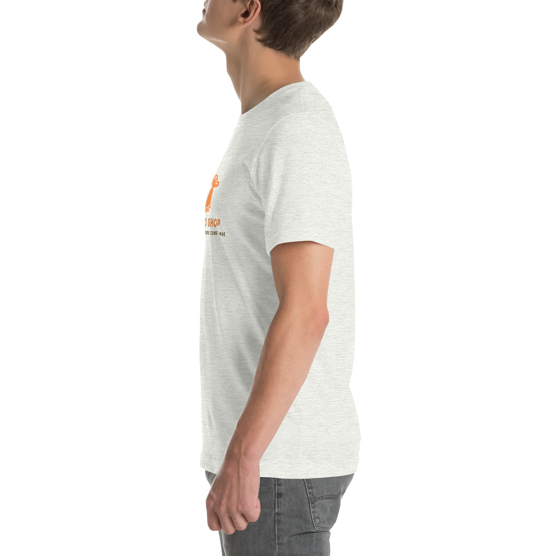 Person wearing an ash white t-shirt with a logo on the chest against a white background