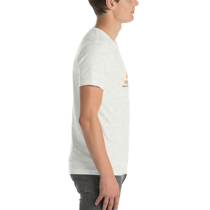 Person wearing an ash white  t-shirt with a logo on a white background