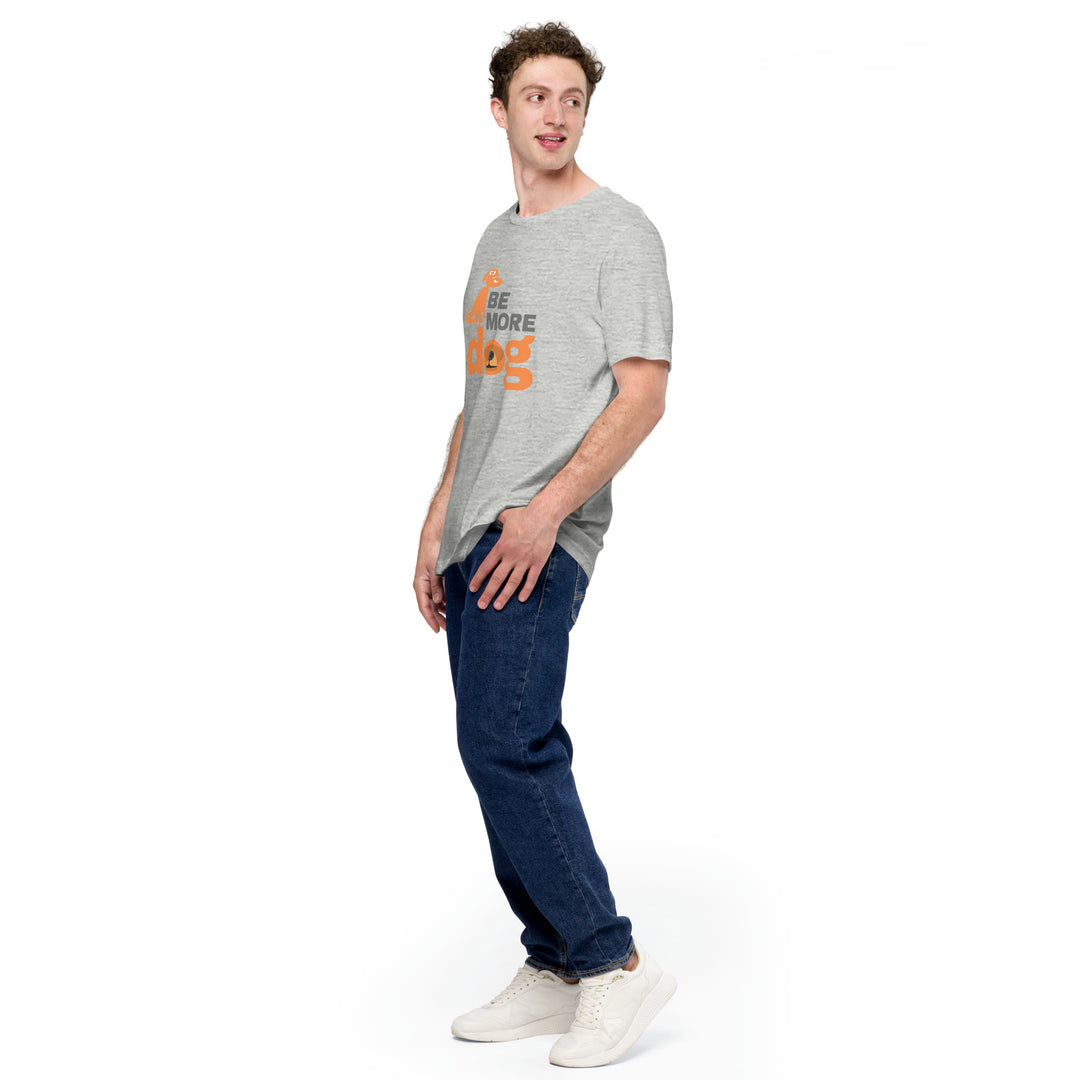 Man wearing a gray t-shirt with orange text and blue jeans on a white background