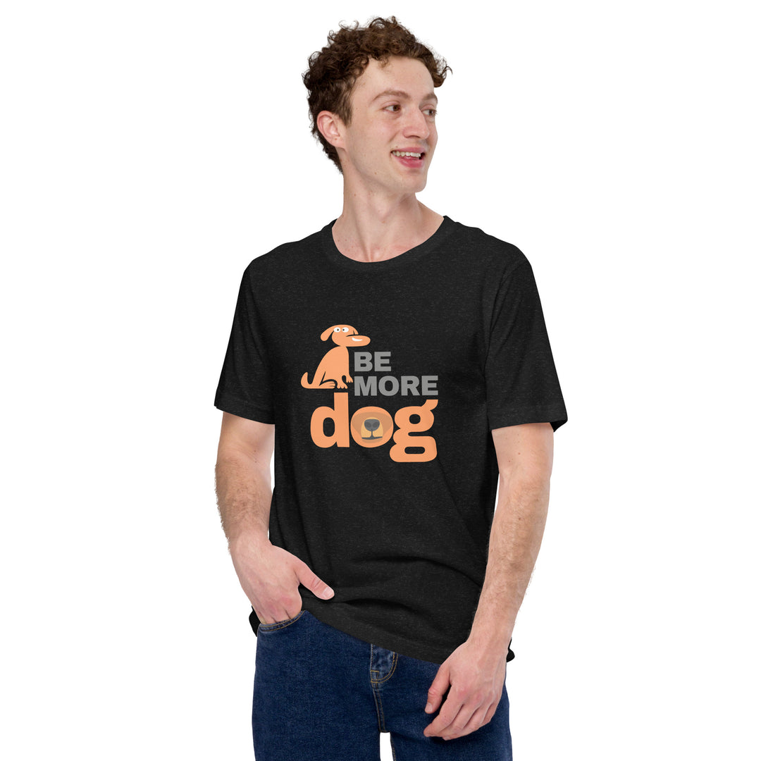 Person wearing a black t-shirt with 'Be More Dog' text and graphic on a white background