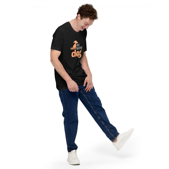 Person wearing a black heather t-shirt with text and blue jeans on a white background