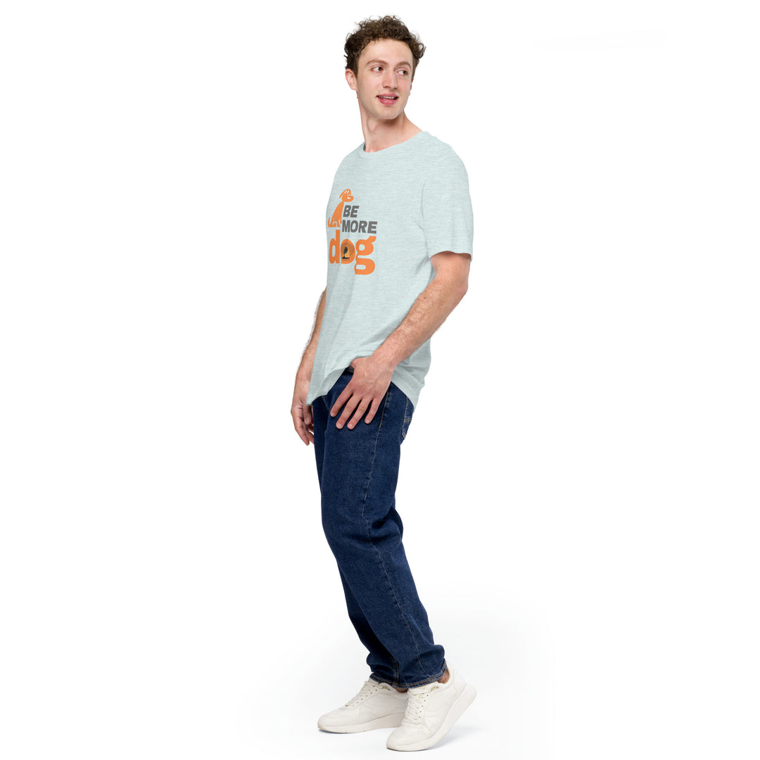 Man wearing a light blue t-shirt with text and dark jeans on a white background