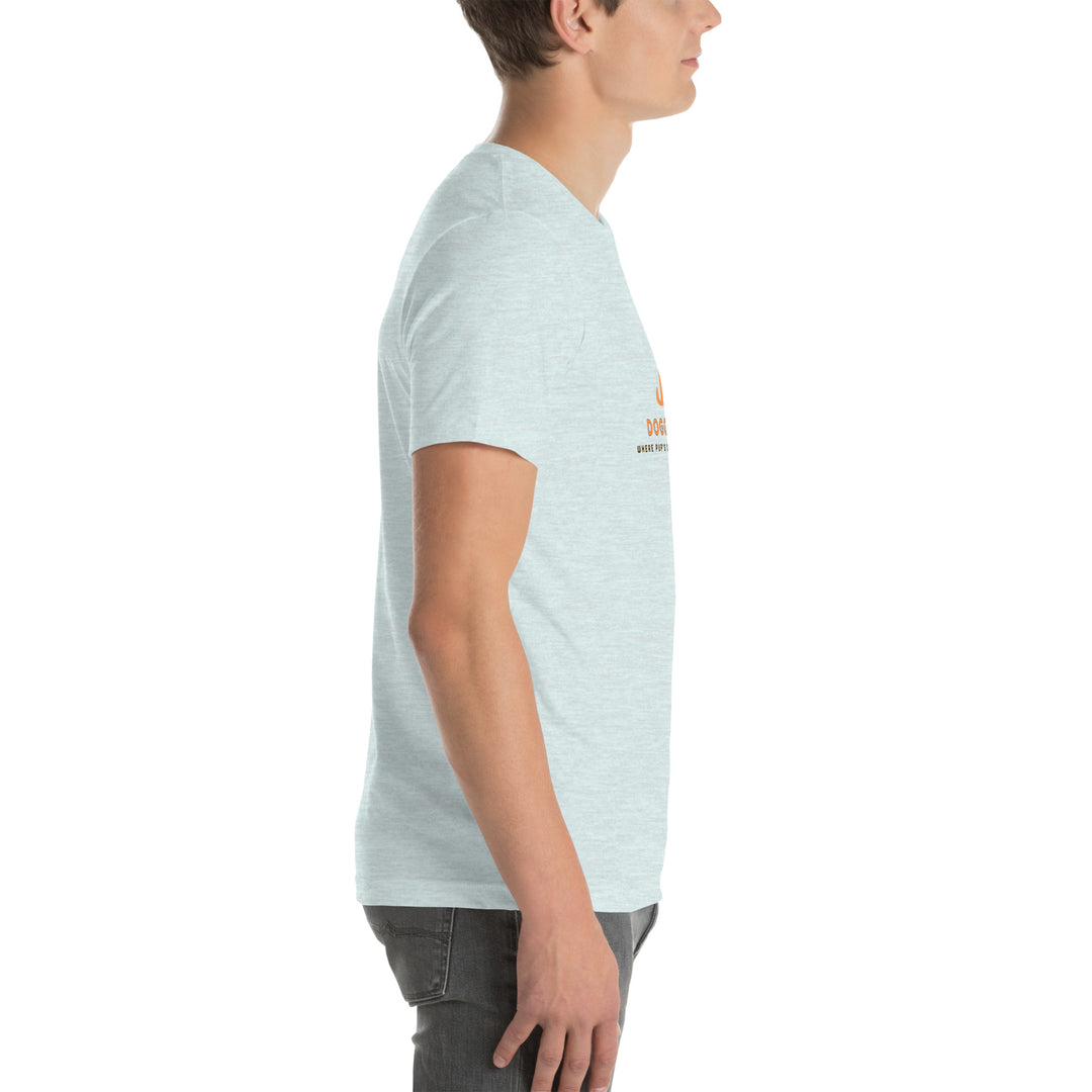 Person wearing a light blue t-shirt with a logo on a white background