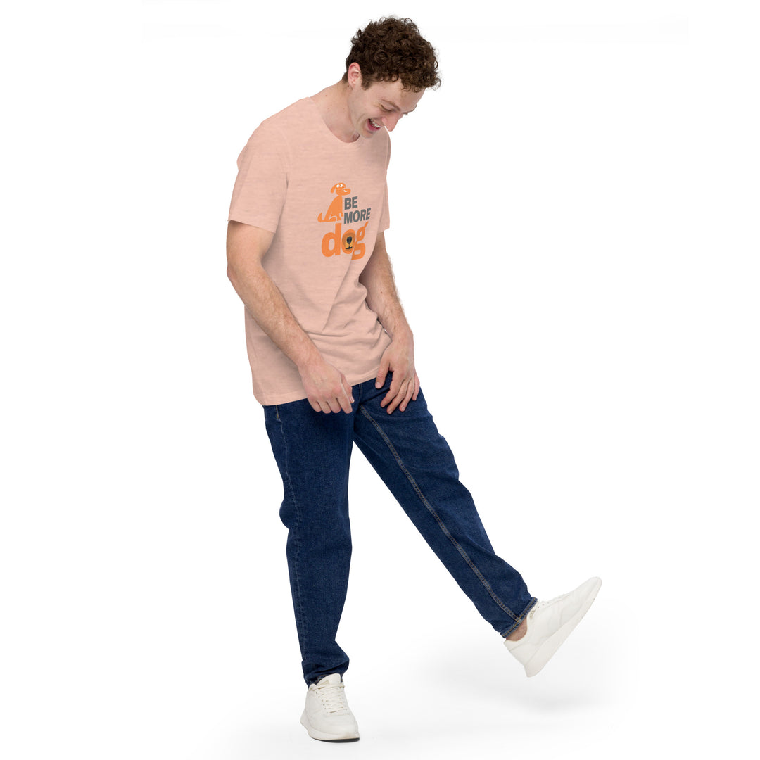 Person wearing a light pink t-shirt with text and dark blue jeans on a white background