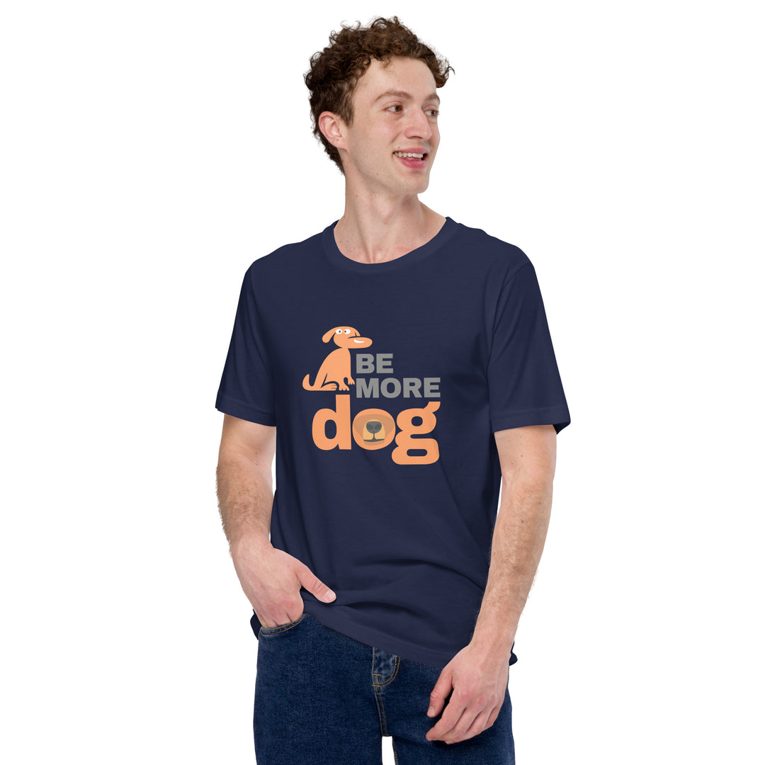 Man wearing a navy blue t-shirt with 'Be More Dog' text and graphic on a white background